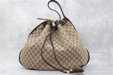 gucci interlockingicon shoulder bag modelli tela|gucci shoulder bag.